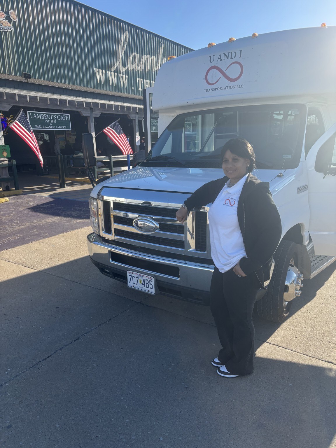 U AND I Transportation branded shuttle and team member